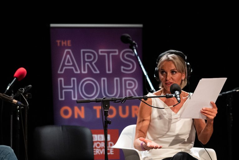 Presenter Nikki Bedi on stage of the radio programe The arts hour on tour of BBC World Service.